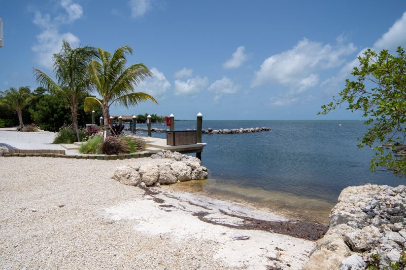 The private beach and boat ramp area