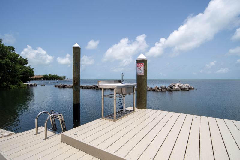 The end of the dock with its ladder and fish cleaning station